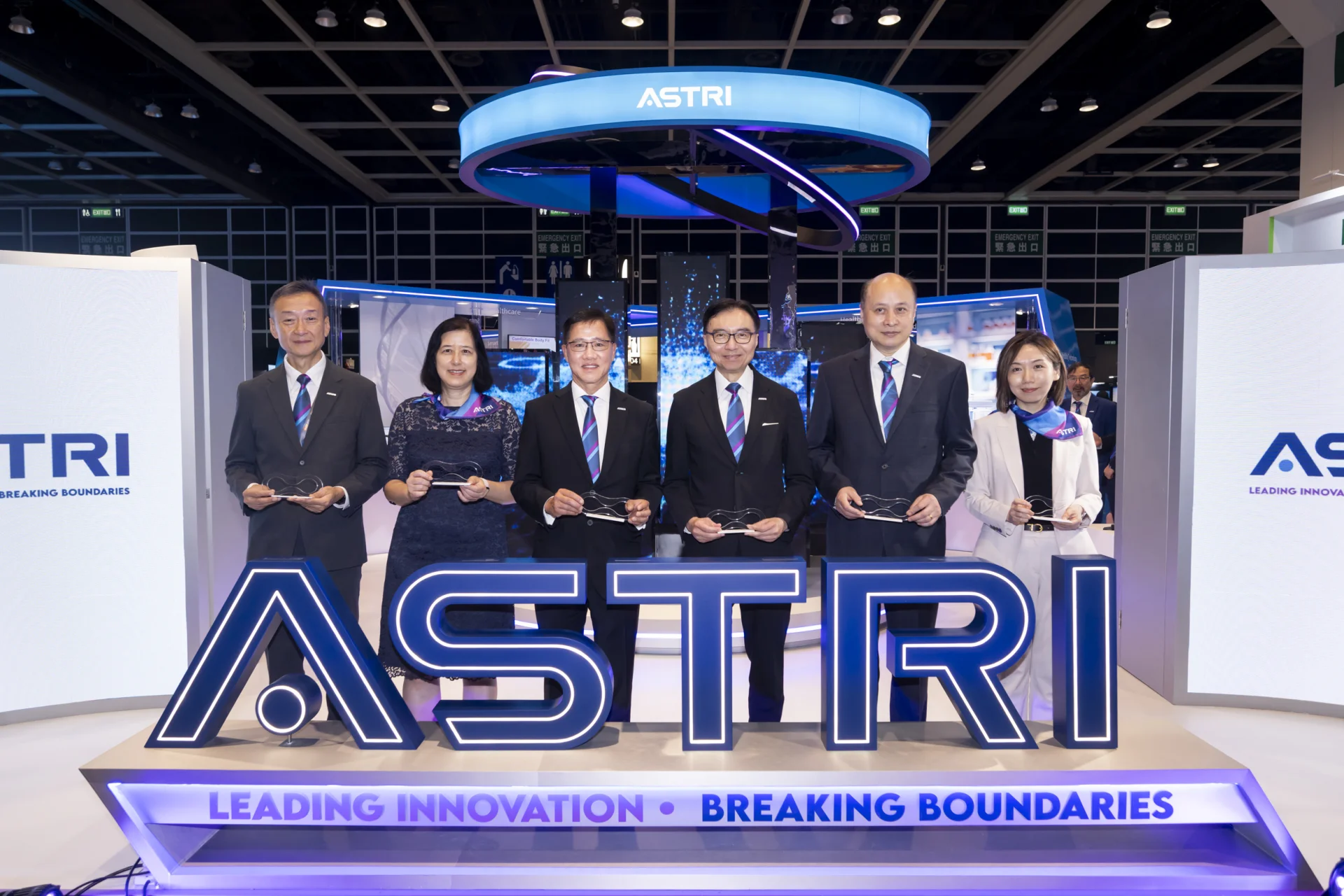 Board Chairman and senior executives of ASTRI officiate at opening ceremony, (from left) Mr Savio Ng Chief Commercial Officer, Ms Jenny Yiu, Chief Operating Officer; Ir Dr Ted Suen, Chief Executive Officer; Ir Prof Sunny Lee, Board Chairman; Dr Ying Huang, Chief Technology Officer; and Dr Tracy Liu, Deputy Chief Technology Officer.