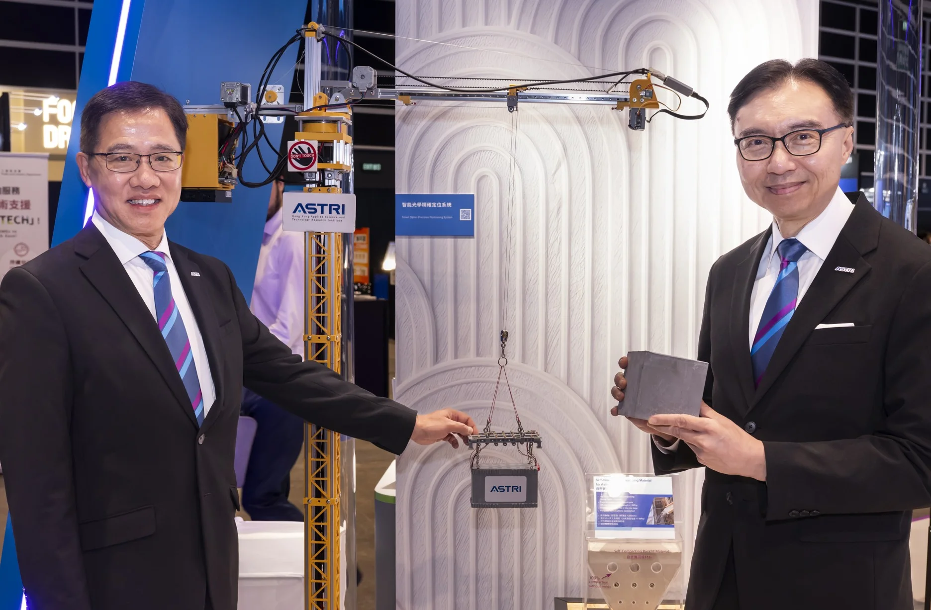 ASTRI showcases 40 market-ready technologies at InnoEX. Picture shows Ir Dr Ted Suen, Chief Executive Officer of ASTRI (left) and Ir Prof Sunny Lee, Board Chairman of ASTRI at the fair.
